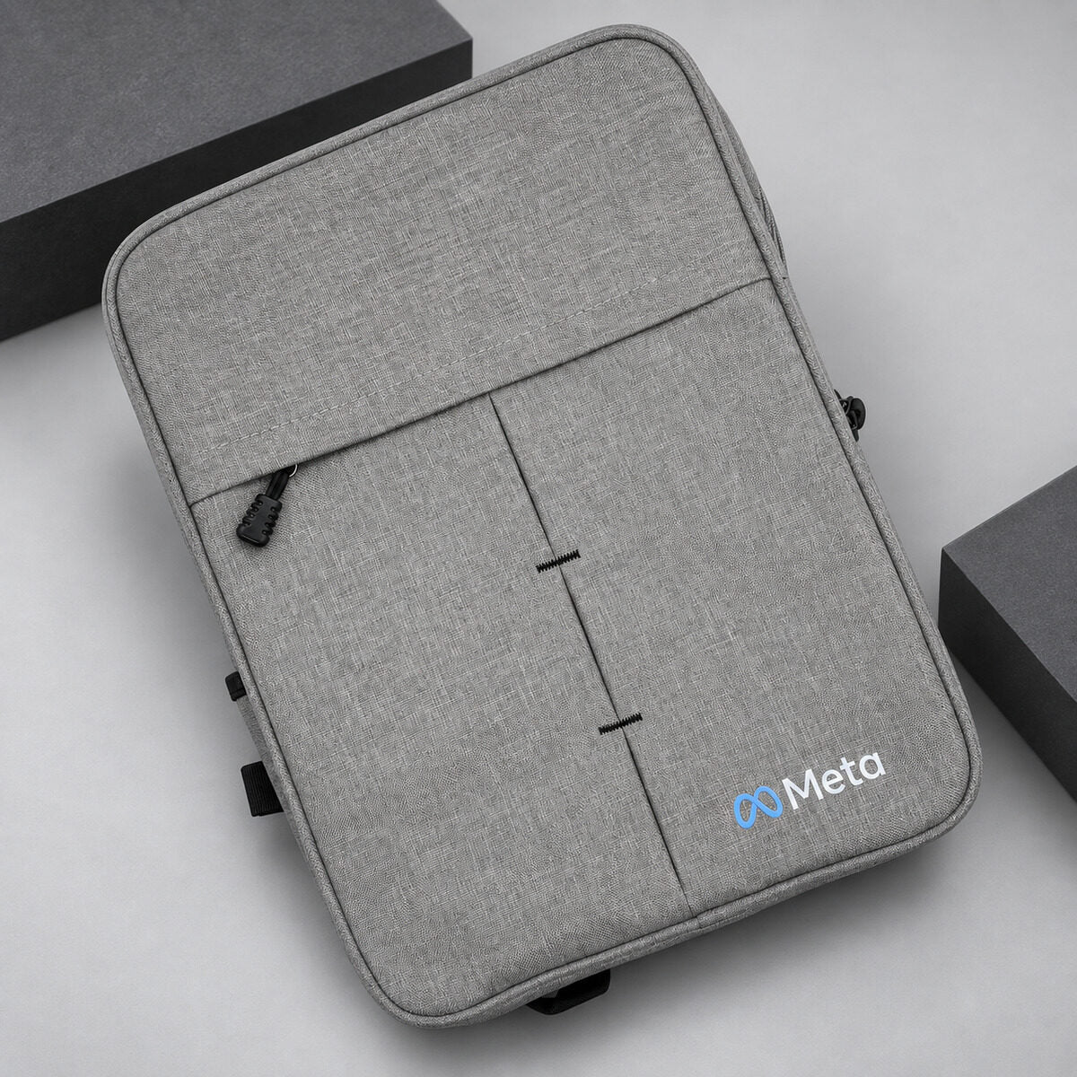 Two colours on a grey laptop sleeve