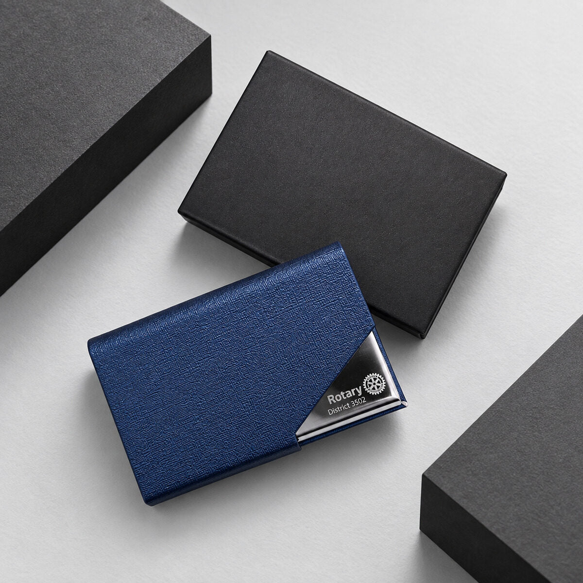 An engraved emblem on a card holder